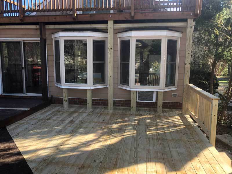 Different angle of deck boards replaced, we also added supports for bay windows